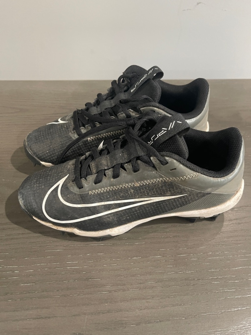 Nike Black and Gray Baseball Cleats with White Swoosh